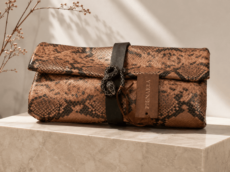Pignarea rosa Snake veske